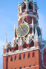 Spasskaya clock tower of Moscow Kremlin at blue sky background