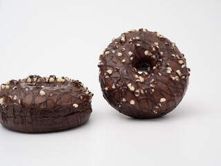 Fresh chocolate donut on a white background. Chocolate donut