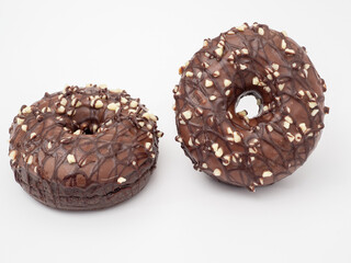 Fresh chocolate donut on a white background. Chocolate donut