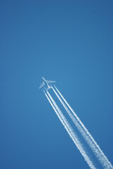 Brtish airways  airbus A380, high flying four-engine passenger plane, aircraft,  clear bleu sky, contrails 