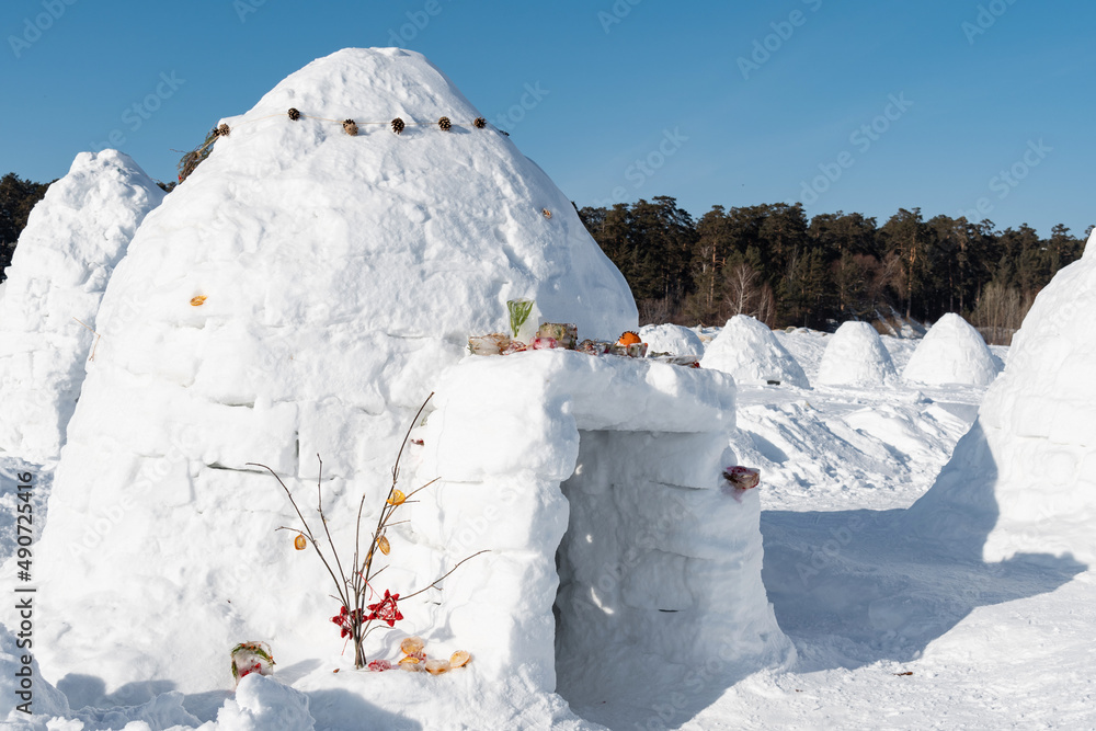 Wall mural Real snow igloo house in the winter.