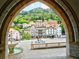 View of The Town of Sintra from an archway of Sintra National Palace. - obrazy, fototapety, plakaty