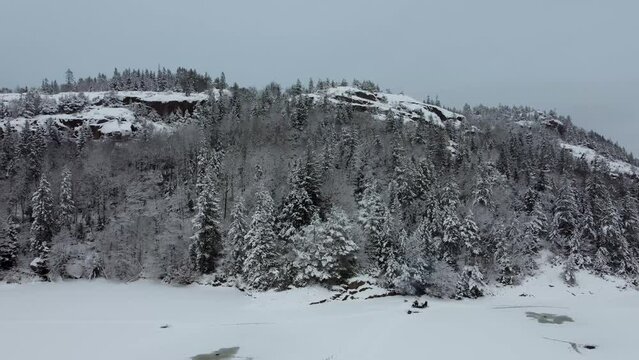 Downward Motion Snow Mountain Dingle Dam Sweden 4K 30fps