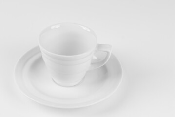 Ceramic coffee mug close up. Coffee isolated on a white background. Copy space and free space for text near the drink.