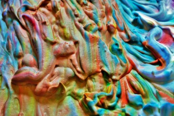rainbow colored background shaving cream and food coloring texture 