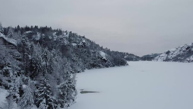 Soaring Close to Snow Covered Lake Dingle Dam Sweden 4K 30fps