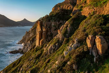 Fototapeten Chapman's peak pass - between Hout Bay and Noordhoek.  This scenic drive passes along sheer cliff faces and rugged coastline with dramatic sunsets.   © Christopher Salerno