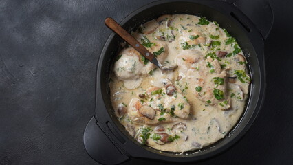 Fried Chicken fillet, with cream sauce and mushrooms