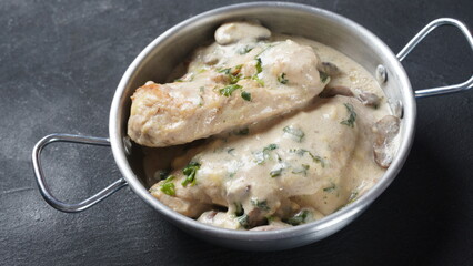 Fried Chicken fillet, with cream sauce and mushrooms