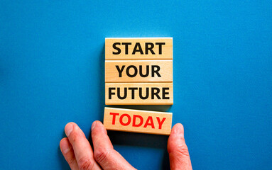 Start your future today symbol. Concept words Start your future today on wooden blocks. Businessman...