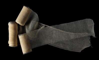 Medical bandage roll isolated on black 