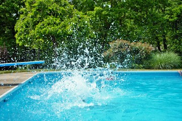 Big splash after someone jumped off the diving board