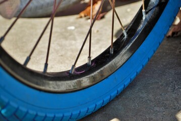 selective focus close up of parts on a childs bike