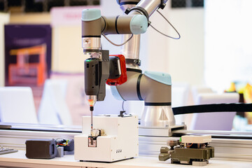 Automatic machine robot arm tool in manufacture factory. Concept smart Industrial 4.0 technology