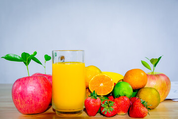 Expert nutritionists consider which healthy fruits and vitamins on a wooden table with healthy fruits, vegetables, weight loss and diet ideas are popular.