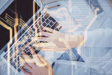 Double exposure of woman hands working on computer and tech theme hologram drawing. Top View. Technology concept.