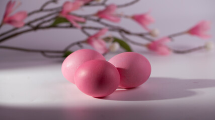 Easter eggs in a beautiful and simple composition with decorations