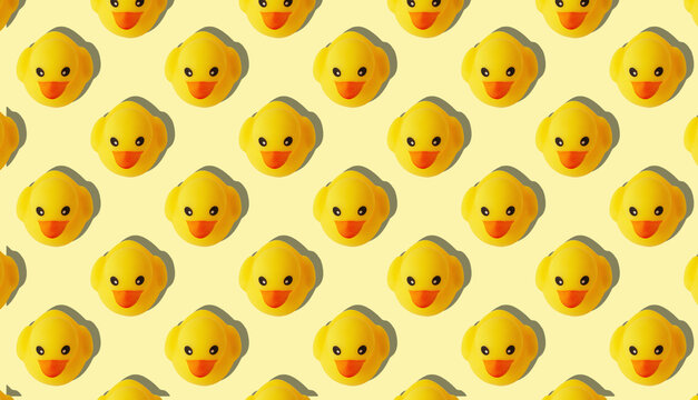 a pattern of yellow rubber ducks on a yellow background 