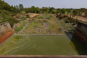 The basin behind the dam that connects to the delivery canal.