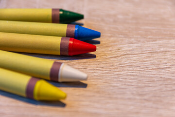 Fototapeta premium colorful wax crayons on a table