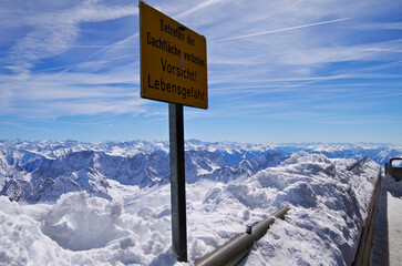 Breathtaking scenic landscape Alpine mountain range view with cable car on top of Zugspitze summit...