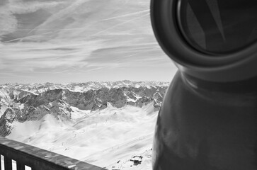 Breathtaking scenic landscape Alpine mountain range view with cable car on top of Zugspitze summit...