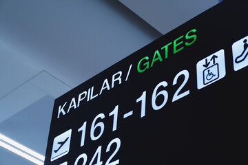 Close up shot of airport gates information board