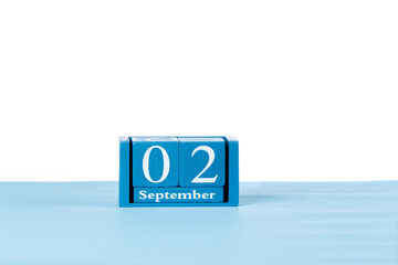 Wooden calendar September 02 on a white background