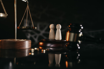 Document with wax seal, scales and antique stamp on a desk. Last will and legacy concept