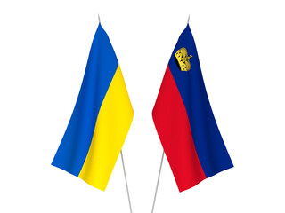 National fabric flags of Ukraine and Liechtenstein isolated on white background. 3d rendering illustration.