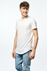 Portrait of handsome man in white t-shirt isolated on white background