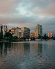 Fototapeta na wymiar Sunset view of the downtown skyline with Lake Merritt, in downtown Oakland, California