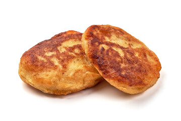Freshly baked cottage cheese pancakes, isolated on white background.