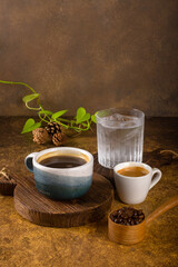 an aromatic coffee freshly grinding to pouring become hot or cold black coffee at wooden rustic tray 