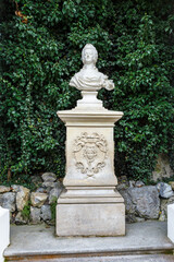 Historical stone bust on a pedestal