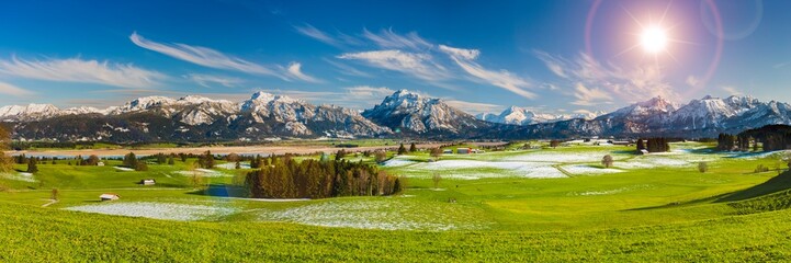 Fototapeta na wymiar panoramic landscape in Bavaria with mountain range and lake