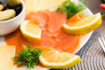 Smoked salmon appetizer with lemon
