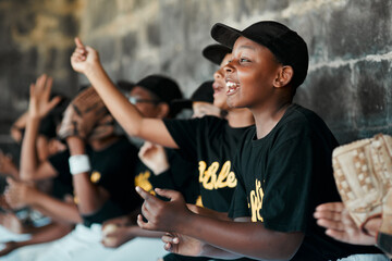Win or lose, were proud of our team. Cropped shot of a group of young baseball players cheering and supporting their team from the bench during a game.