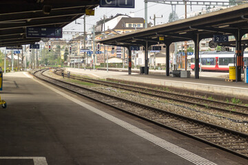 Urban railway station with deserted platform