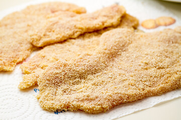 Breaded slices of thin meat in a schnitzel