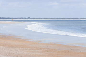 Beach, ocean, waves, blue sky with clouds 
