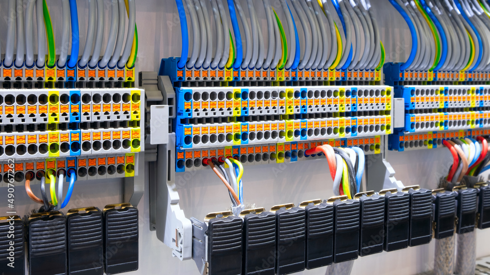 Poster color wires in a box of distribution of an electricity, plc control panel with wiring, lectric contr