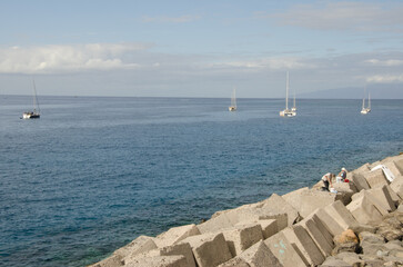 Breakwater in the port of Los Cristianos. Los Cristianos. Arona. Tenerife. Canary Islands. Spain.