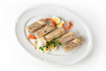 Jellied chicken and turkey on a white plate. Banquet festive dishes. Gourmet restaurant menu. White background.