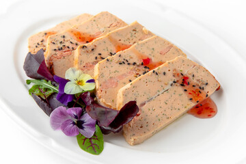 Salmon fillet pate with fillet pieces in sauce. Banquet festive dishes. Gourmet restaurant menu. White background.