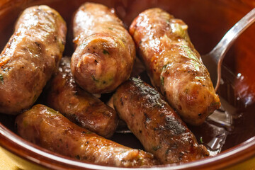 Freshly cooked sausages in bowl
