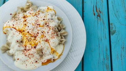 Traditional Turkish food manti. Top view of traditional Turkish dish food manti. 