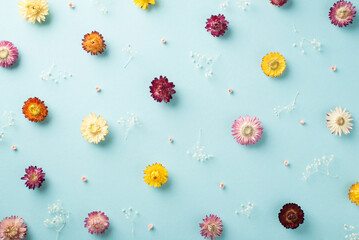Top view photo of the many different nice flowers and white branches of gypsophila with a tiny...