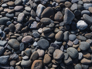 Background of stones by the sea. Concept texture and backgrounds