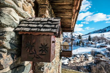 Wooden house in the snow